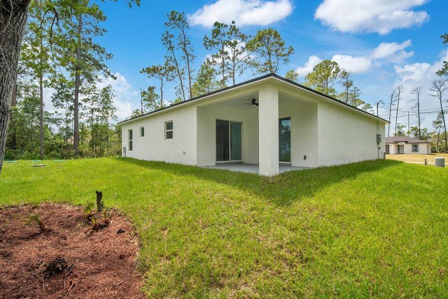 Front exterior of a new home in , Deland, FL, highlighting curb appeal (Image 16). Front exterior of a new home in , Deland, FL, highlighting curb appeal (Image 16).