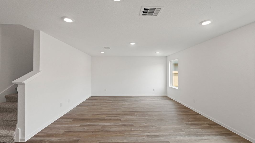 Representative unfurnished interior of a home built from the Davis by D.R. Horton in Lake Conroe Cove, Willis (Image 15).