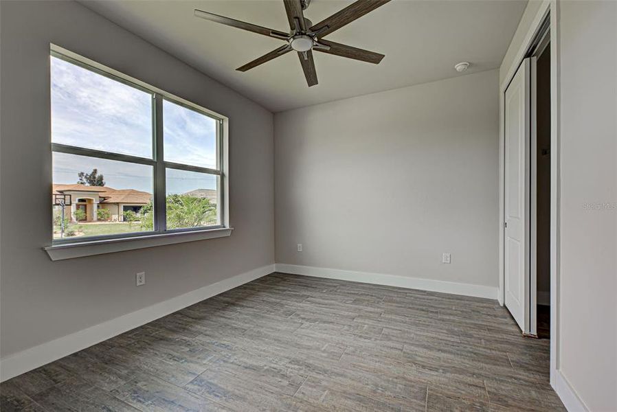 Spacious, unfurnished interior of a new home in , Port Charlotte (Image 21).