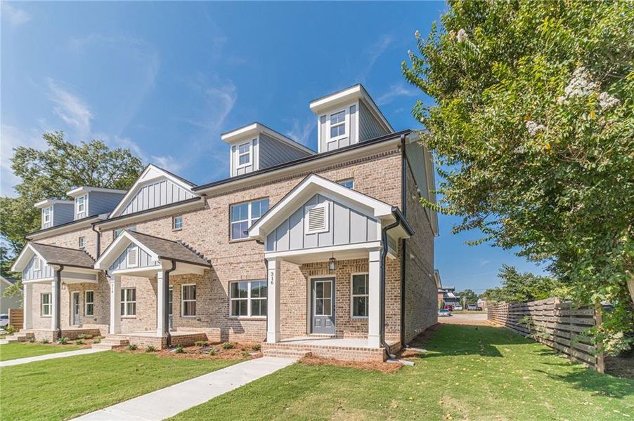 Front exterior of a new home in , Monroe, GA, highlighting curb appeal (Image 21). Front exterior of a new home in , Monroe, GA, highlighting curb appeal (Image 21).