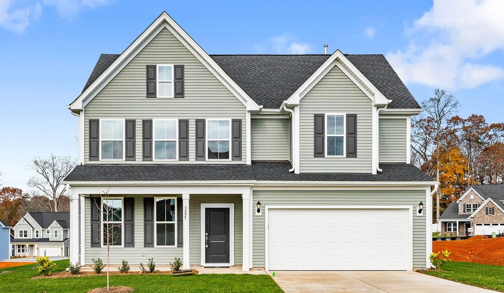 Front exterior of a new home in Hanes Lake, Winston-Salem, NC, highlighting curb appeal (Image 1).