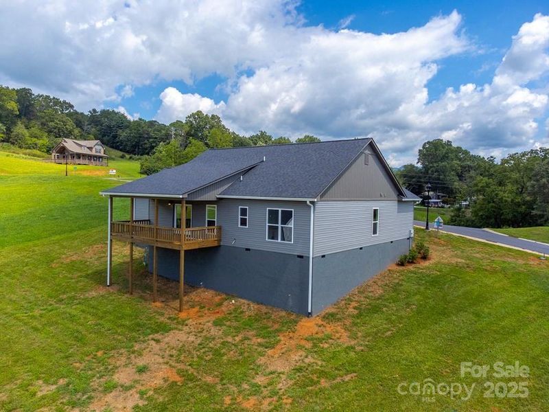 Front exterior of a new home in , Franklin, NC, highlighting curb appeal (Image 1). Front exterior of a new home in , Franklin, NC, highlighting curb appeal (Image 1).