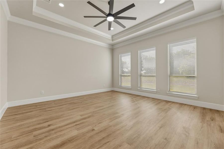 Gorgeous Master with Luxury vinyl wood plank, sculptured ceiling and double crown moulding Gorgeous Master with Luxury vinyl wood plank, sculptured ceiling and double crown moulding