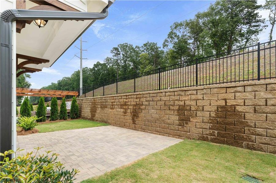 Front exterior of a new home in Palisades Single Family, Cumming, GA, highlighting curb appeal (Image 26).