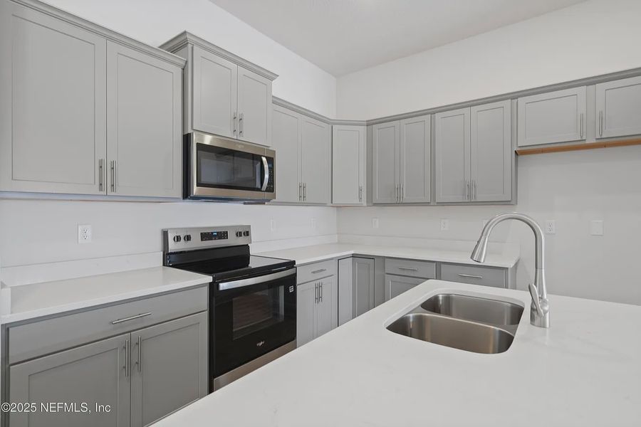 Furnished interior view inside a new home in Shadow Crest at Rolling Hills, Green Cove Springs (Image 7).