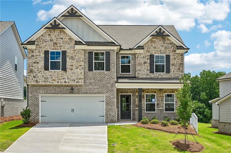 Front exterior of a new home in Fowler Farms, Auburn, GA, highlighting curb appeal (Image 25).