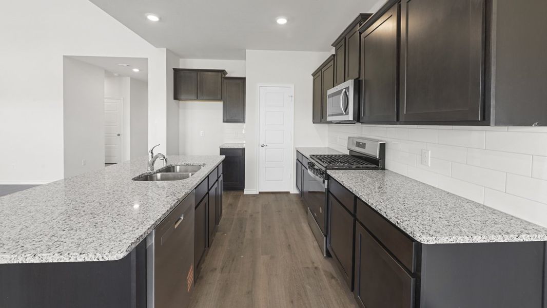 Representative furnished interior of a home built from the Tangerine by D.R. Horton in Bel Air Village, Sherman (Image 5).