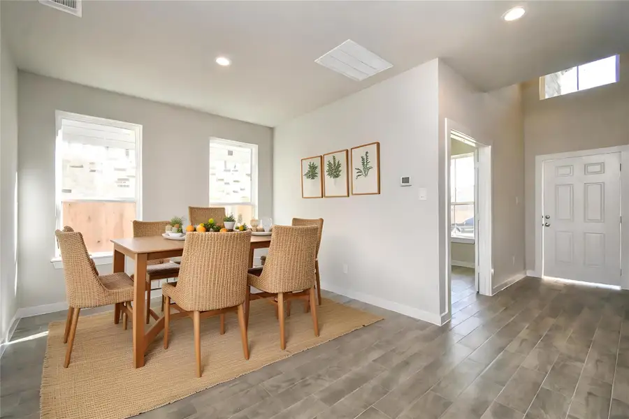 *Virtually Staged* Dining Room. Sample photo of completed home with similar floor plan. Actual colors and selections may vary.