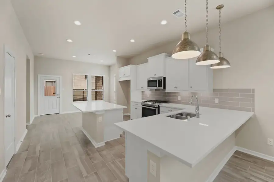 Representative furnished interior of a home built from the Berkeley by Chesmar Homes in Evergreen, San Antonio (Image 3).