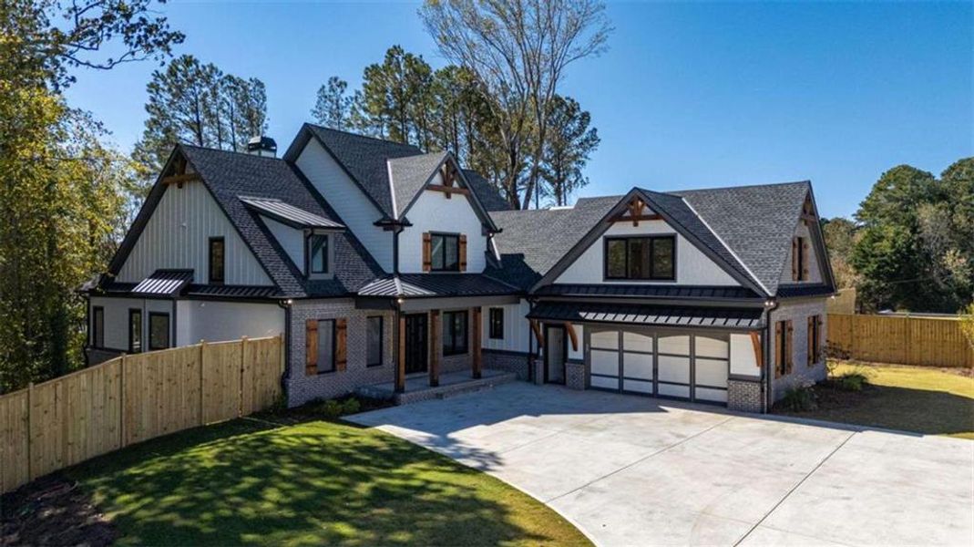 Front exterior of a new home in , Cumming, GA, highlighting curb appeal (Image 32).