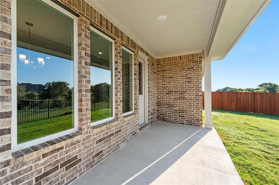 Exterior details and patio area of a home in Morningstar, Aledo (Image 24).