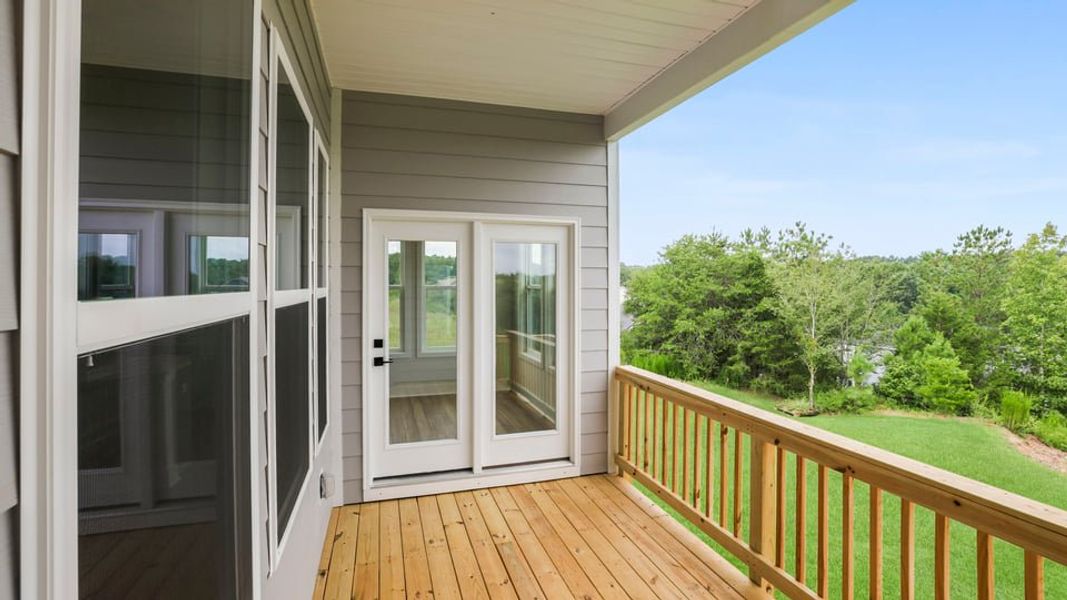 Exterior details and patio area of a home in Sunset Summits, Spartanburg (Image 21).
