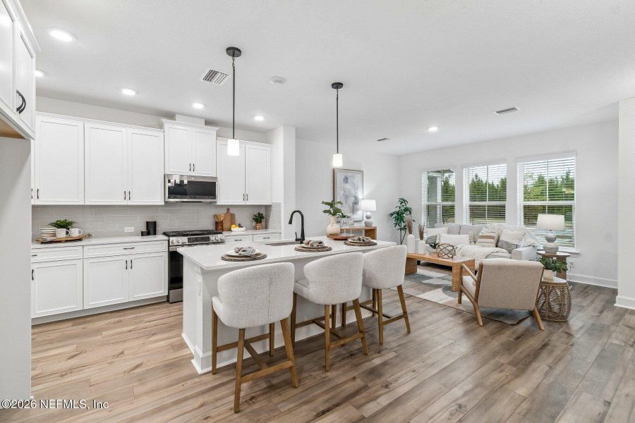 Furnished interior view inside a new home in Westerly Park at Wildlight - Courtyard Collection, Yulee (Image 7).