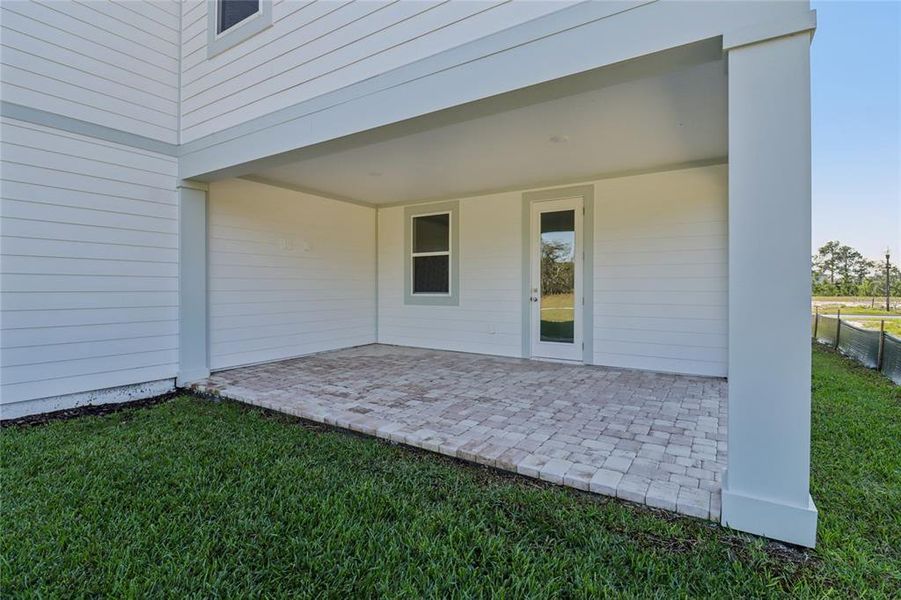 Exterior details and patio area of a home in Northlake Traditional, Winter Garden (Image 3).
