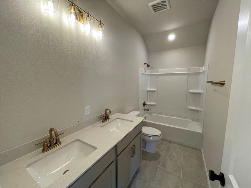 Furnished interior view inside a new home in Covered Bridge, Hutto (Image 11). Furnished interior view inside a new home in Covered Bridge, Hutto (Image 11).