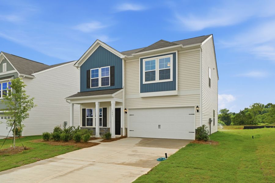 Front exterior of a new home in Piper Creek, Newton, NC, highlighting curb appeal (Image 2). Front exterior of a new home in Piper Creek, Newton, NC, highlighting curb appeal (Image 2).