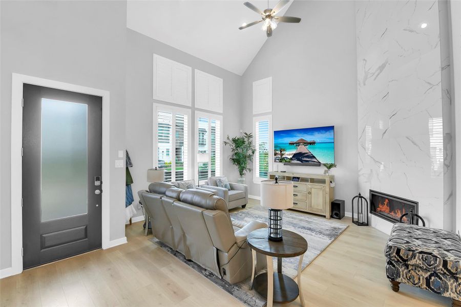 Clean and fresh neutral colors, elegant Plantation shutters throughout.