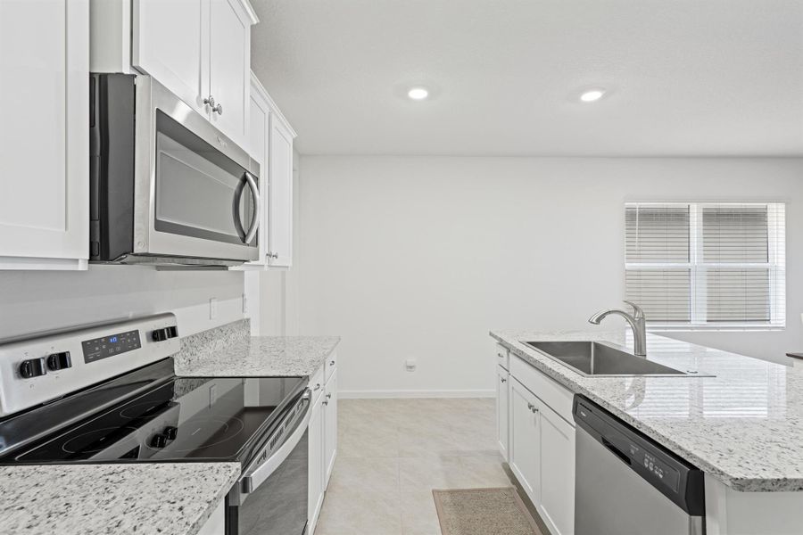 Furnished interior view inside a new home in , Port St. Lucie (Image 4).