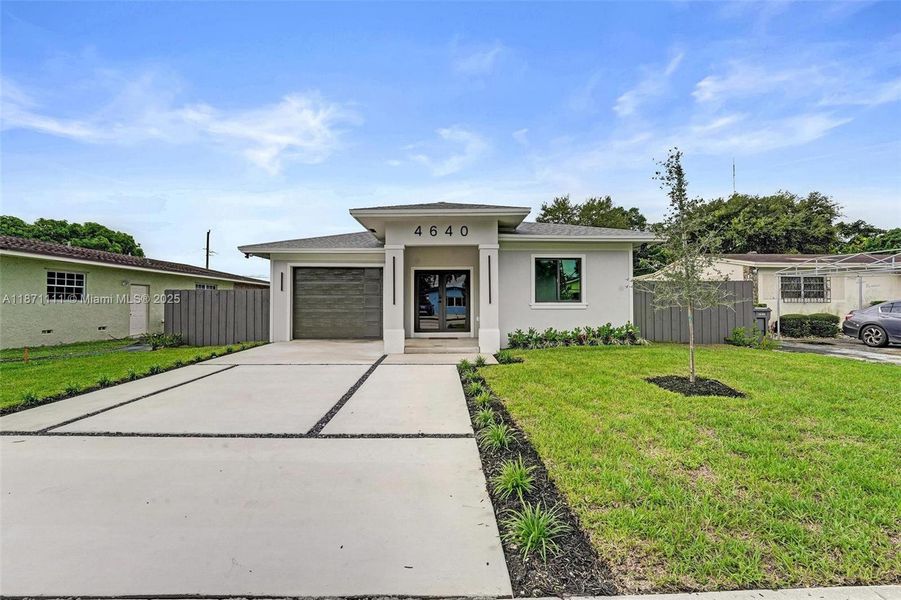 Front exterior of a new home in , West Park, FL, highlighting curb appeal (Image 25). Front exterior of a new home in , West Park, FL, highlighting curb appeal (Image 25).