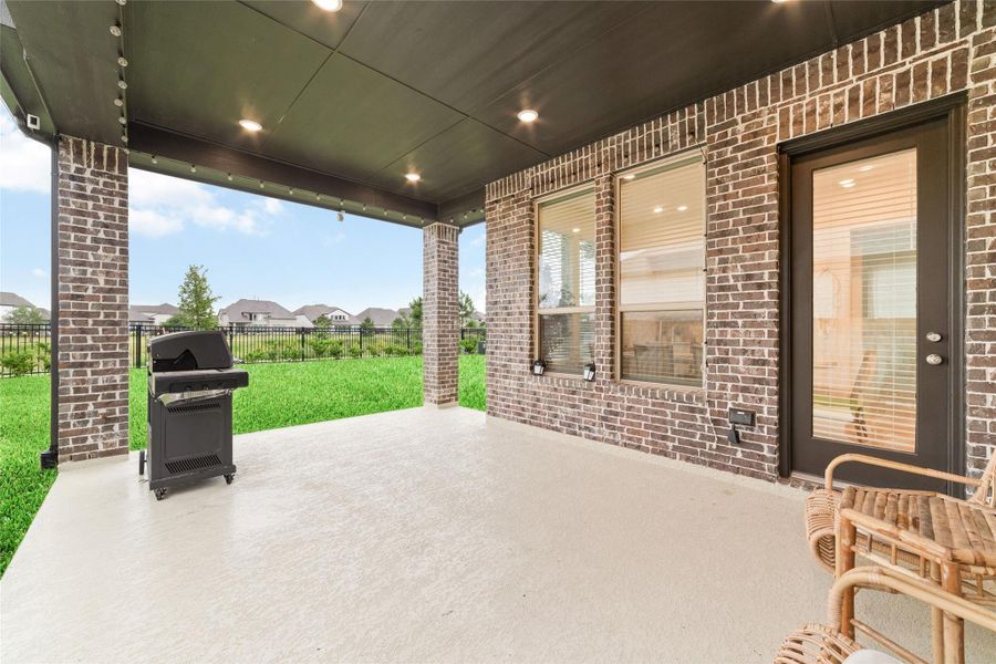 Exterior details and patio area of a home in Elyson, Katy (Image 28).