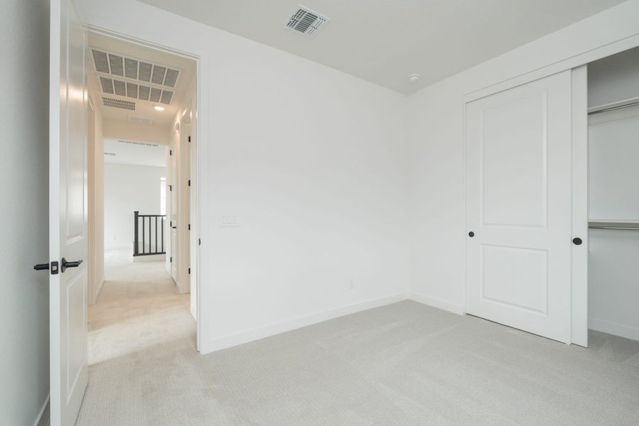 Spacious, unfurnished interior of a new home in Waterston Central, Gilbert (Image 16).