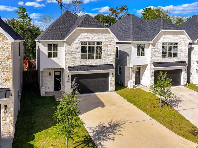 Front exterior of a new home in , Houston, TX, highlighting curb appeal (Image 20).