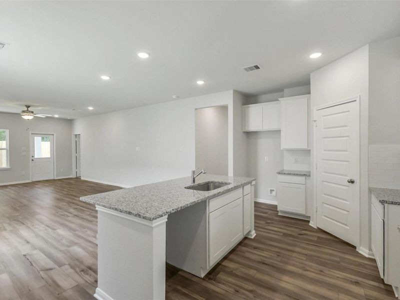 Furnished interior view inside a new home in Caney Creek Place, Conroe (Image 11).