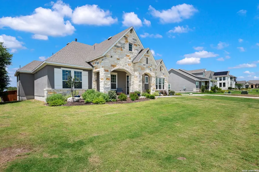 Front exterior of a new home in , Castroville, TX, highlighting curb appeal (Image 1). Front exterior of a new home in , Castroville, TX, highlighting curb appeal (Image 1).