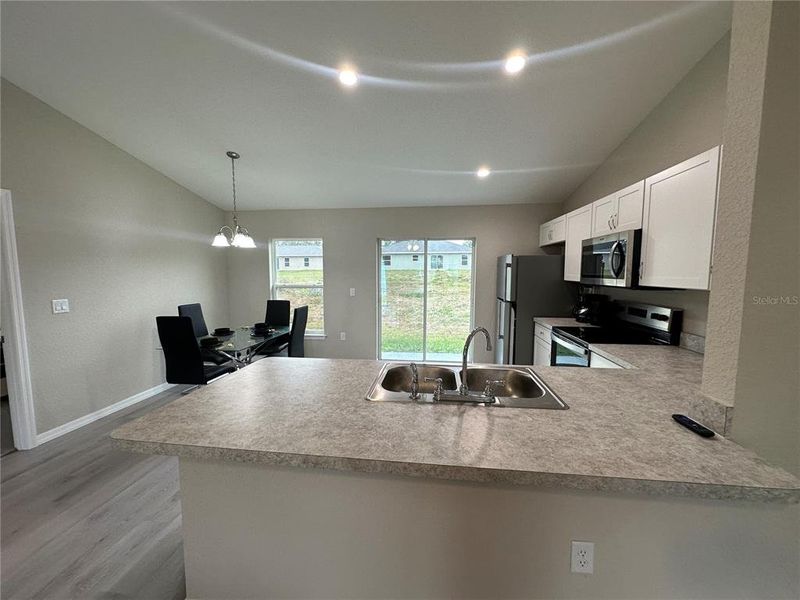 Furnished interior view inside a new home in , Dunnellon (Image 5).