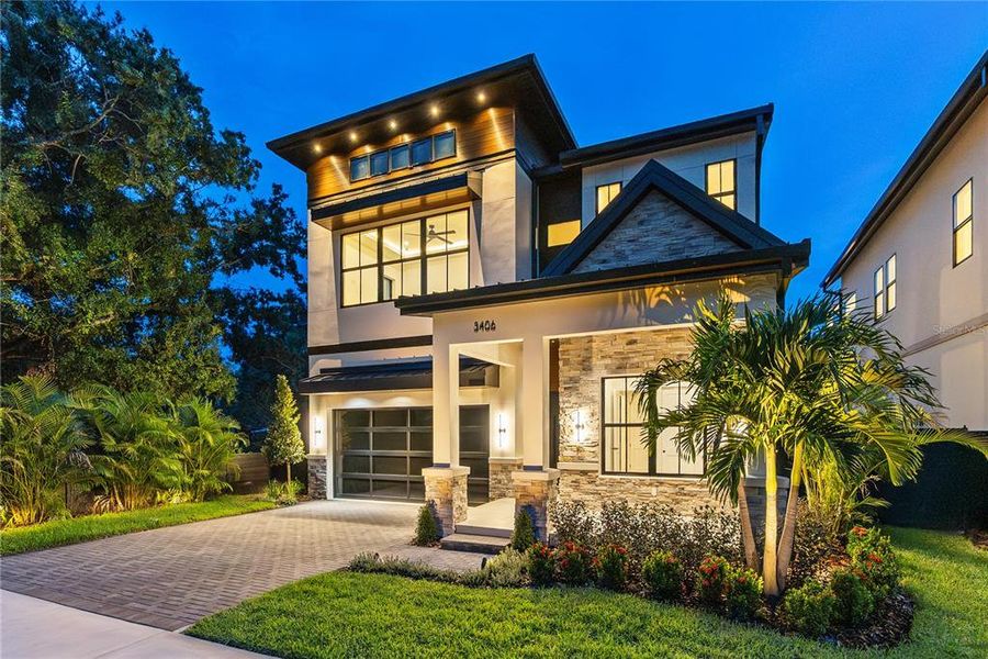 Front exterior of a new home in , Tampa, FL, highlighting curb appeal (Image 1). Front exterior of a new home in , Tampa, FL, highlighting curb appeal (Image 1).
