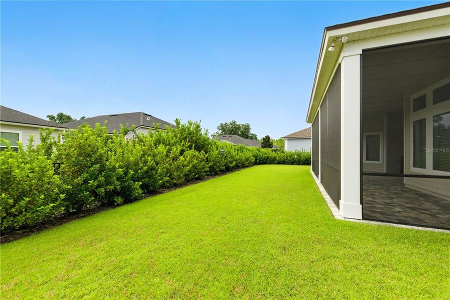 Front exterior of a new home in Oakmont, Gainesville, FL, highlighting curb appeal (Image 23).