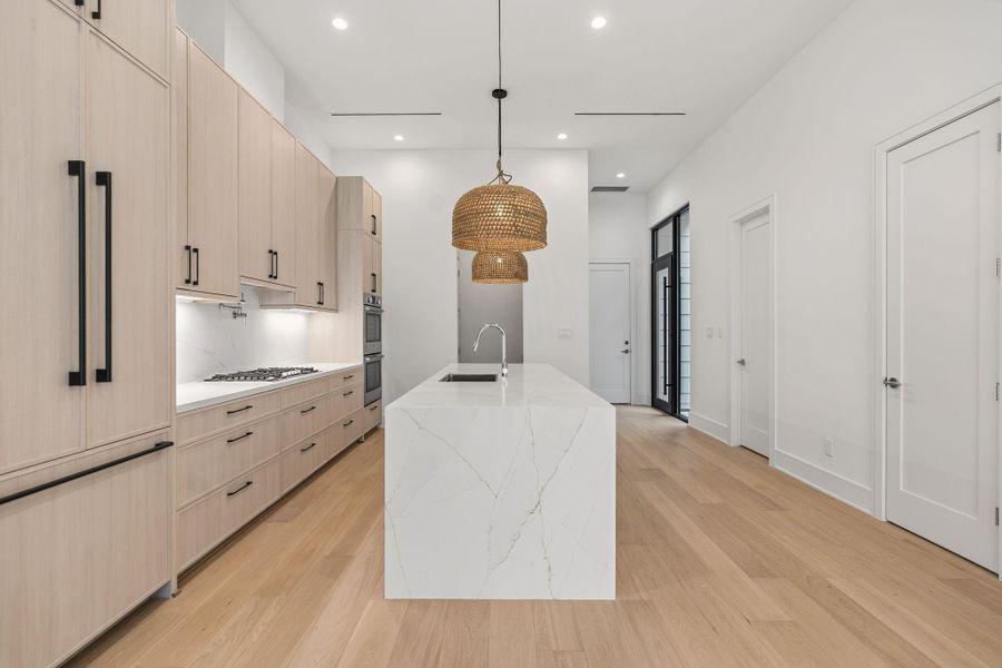 7" wide oak engineered flooring throughout.