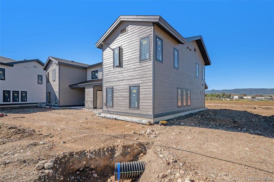 Exterior details and patio area of a home in , Granby (Image 3).
