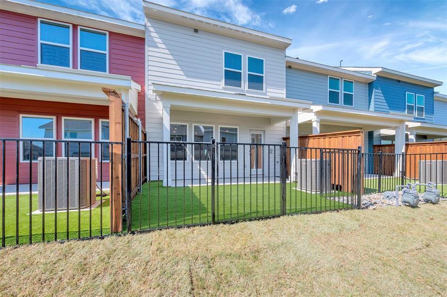 Exterior details and patio area of a home in Providence Commons, Providence Village (Image 18).