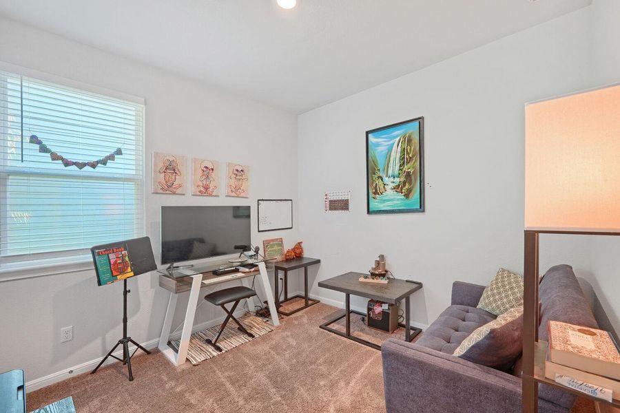 Furnished interior view inside a new home in Stallion Run, Buda (Image 22).