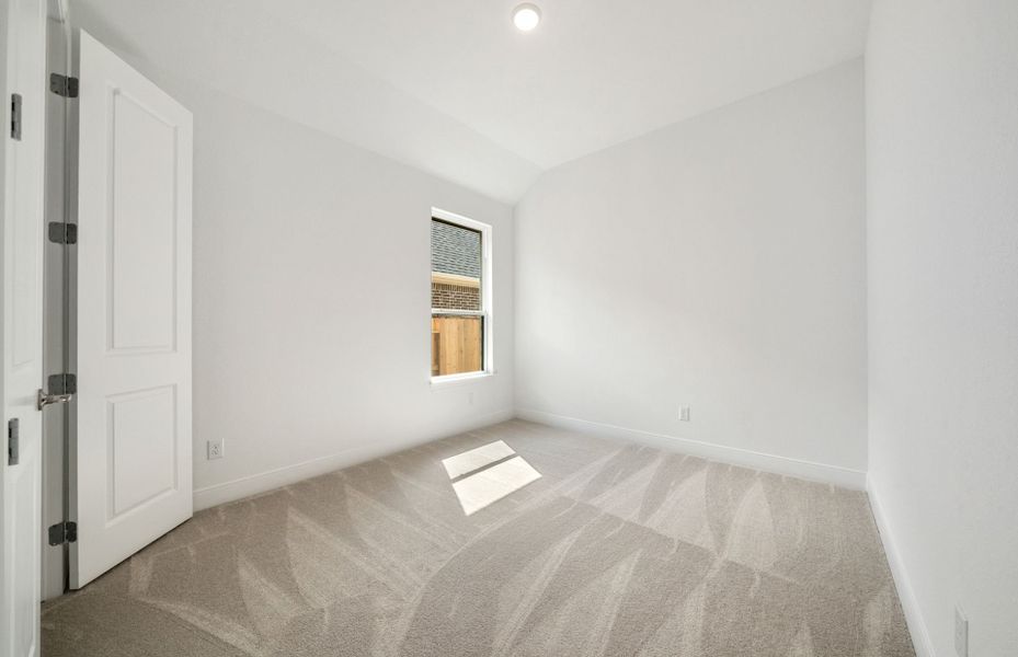 Representative unfurnished interior of a home built from the Chilton by Pulte Homes in Saddleback at Santa Rita Ranch, Liberty Hill (Image 7).