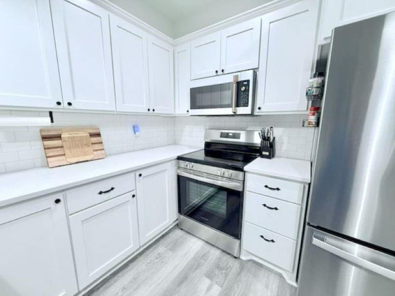Furnished interior view inside a new home in , Brenham (Image 15).