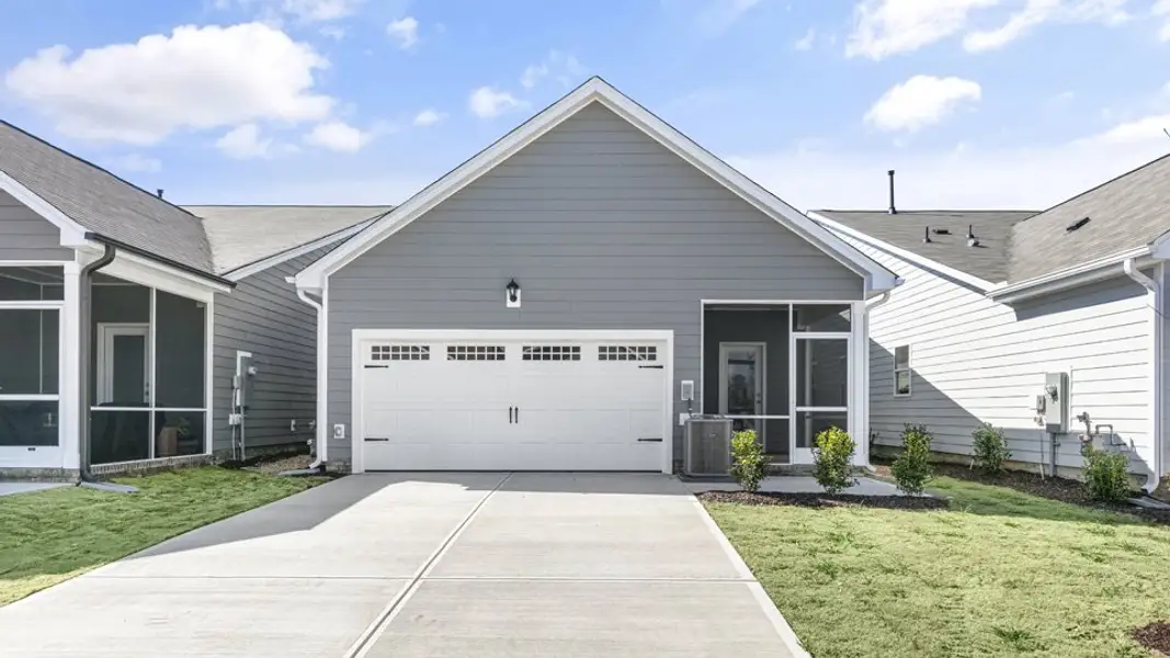 Front exterior of a new home in The Villas at Haywood Glen, Knightdale, NC, highlighting curb appeal (Image 15).