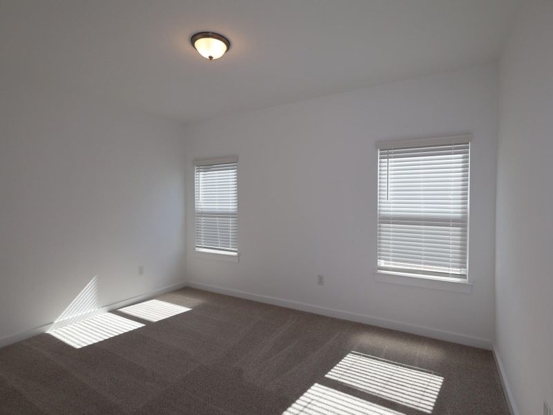 Spacious, unfurnished interior of a new home in Cedar Brook, Leander (Image 12).
