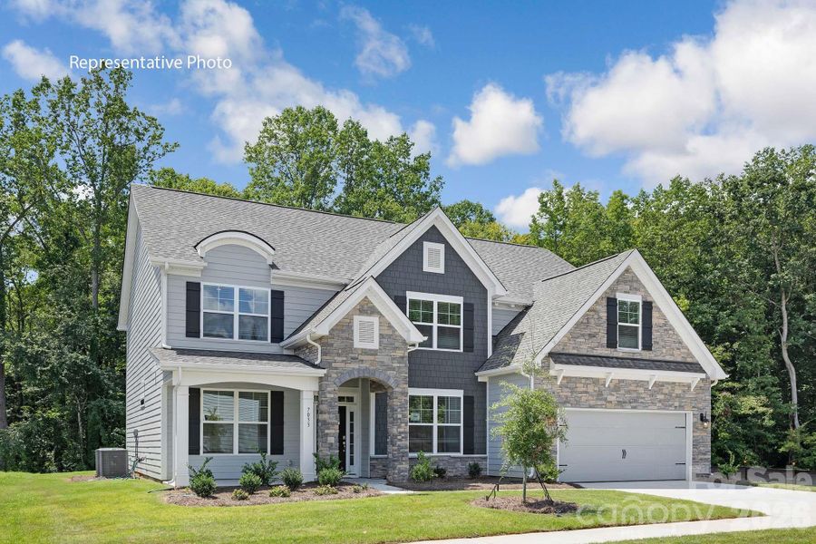 Front exterior of a new home in Sylvan Creek, Denver, NC, highlighting curb appeal (Image 26). Front exterior of a new home in Sylvan Creek, Denver, NC, highlighting curb appeal (Image 26).