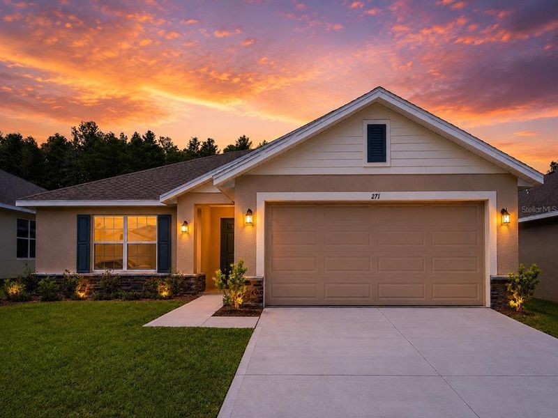 Front exterior of a new home in Arbor Park, Leesburg, FL, highlighting curb appeal (Image 1). Front exterior of a new home in Arbor Park, Leesburg, FL, highlighting curb appeal (Image 1).