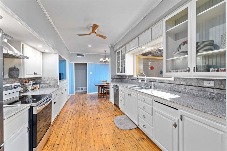 Kitchen with granite countertops and natural light