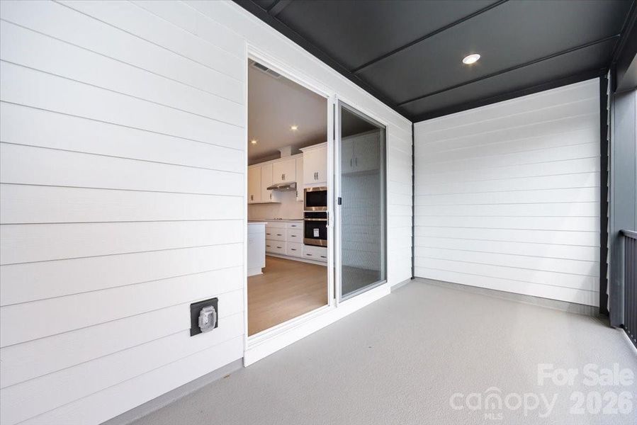 Exterior details and patio area of a home in Bellflower, Charlotte (Image 23).