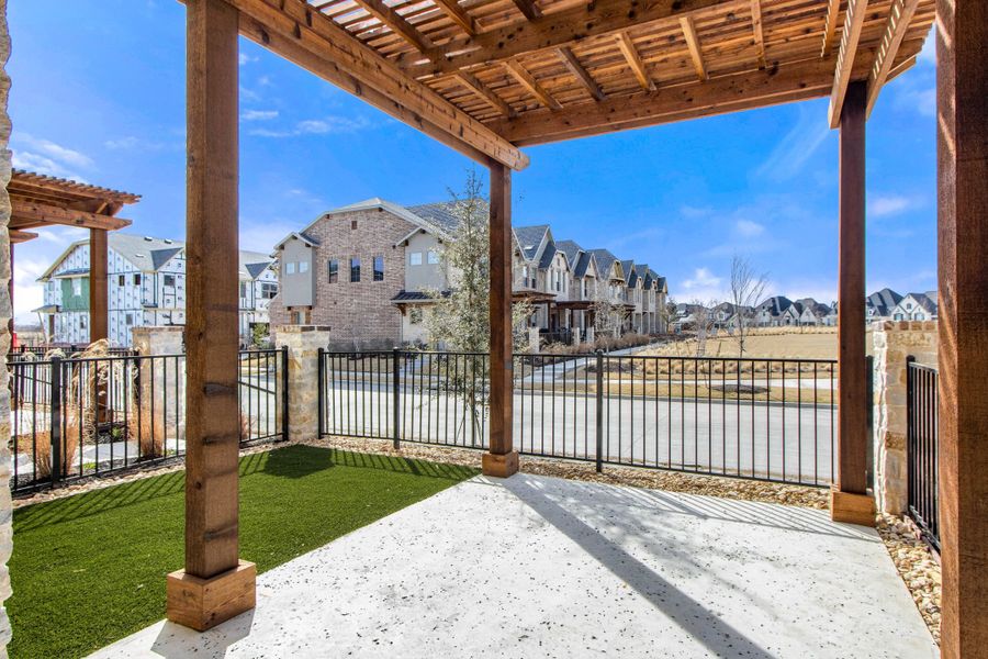 Exterior details and patio area of a home in The Tribute, The Colony (Image 26). Exterior details and patio area of a home in The Tribute, The Colony (Image 26).