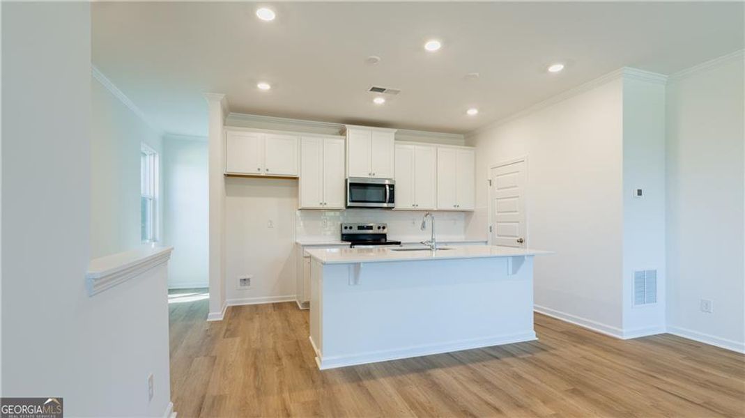 Furnished interior view inside a new home in Benteen Reserve, Atlanta (Image 4).
