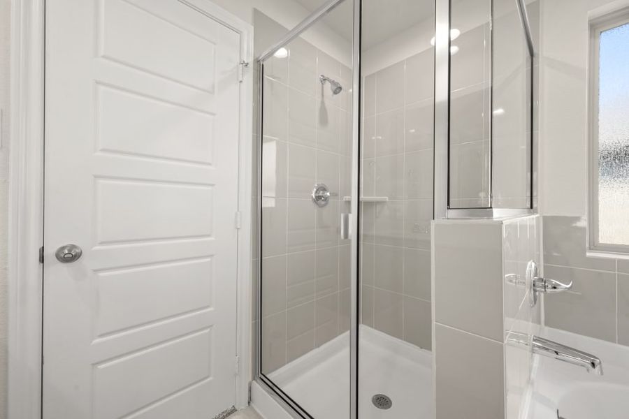 Front exterior of a new home in Myrtle Creek, Waxahachie, TX, highlighting curb appeal (Image 25). Front exterior of a new home in Myrtle Creek, Waxahachie, TX, highlighting curb appeal (Image 25).