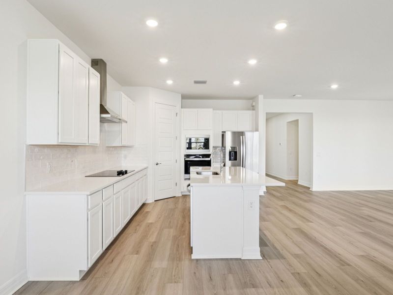 Furnished interior view inside a new home in Crescent Lakes - Signature Series, Punta Gorda (Image 7).