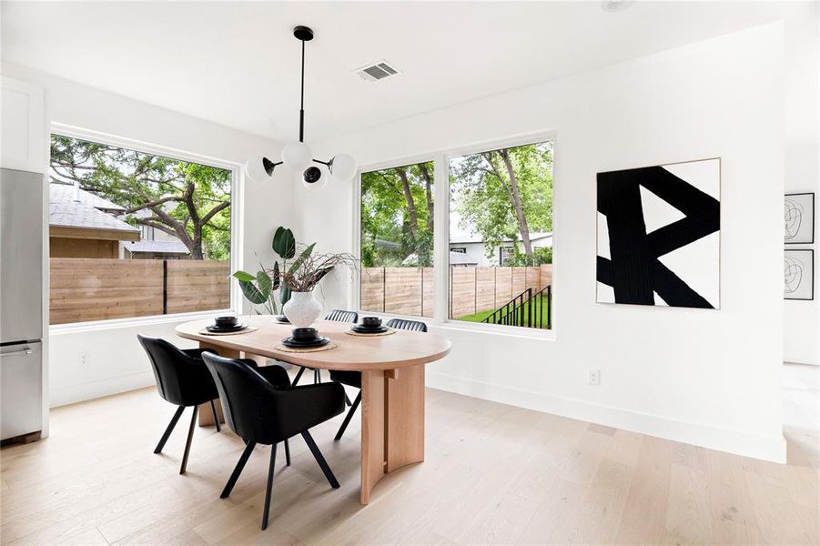 Lots of natural light pouring in to the kitchen/dining area