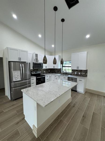 Furnished interior view inside a new home in , Okeechobee (Image 6).