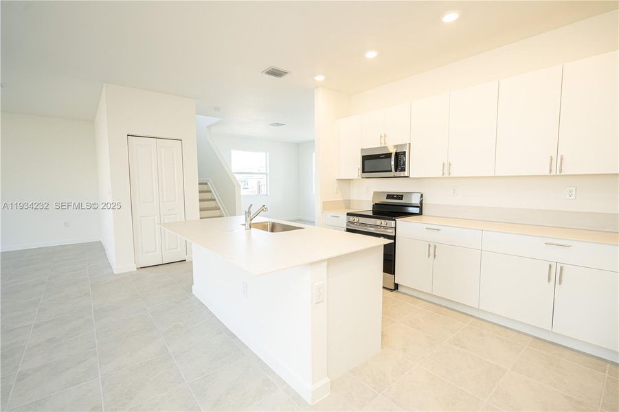 Furnished interior view inside a new home in Acacia Groves, Miami (Image 13).